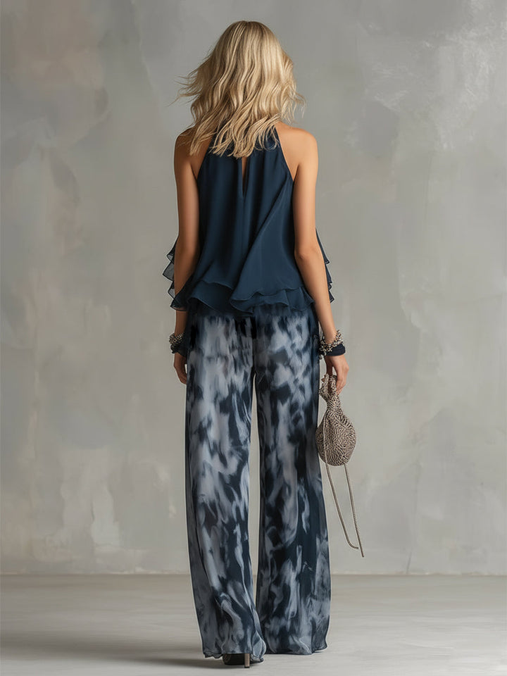 Ludovica - elegant in chiffon with a high-neck top and wide printed pants